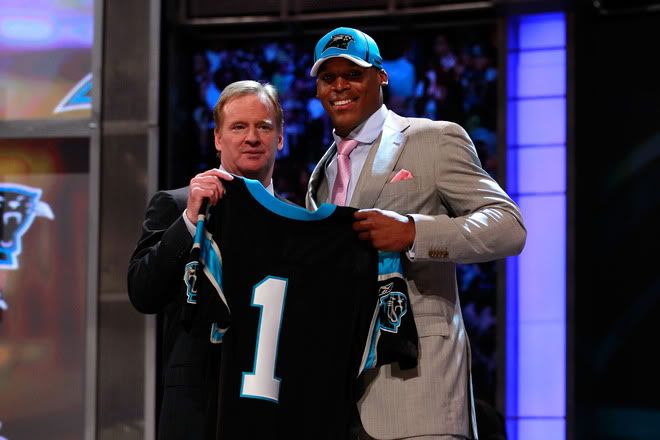 NFL COmmissioner Roger Goodell poses for a photo with Carolina Panthers #1 overall pick Cam Newton from Auburn during the 2011 NFL Draft at Radio City Music Hall on April 28, 2011 in New York City. 