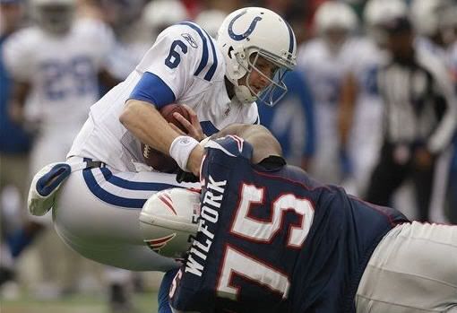Indianapolis Colts quarterback Dan Orlovsky (6) is sacked by New England Patriots nose tackle Vince Wilfork (75) during the first quarter of an NFL football game in Foxborough, Mass., Sunday afternoon, Dec. 4, 2011. 