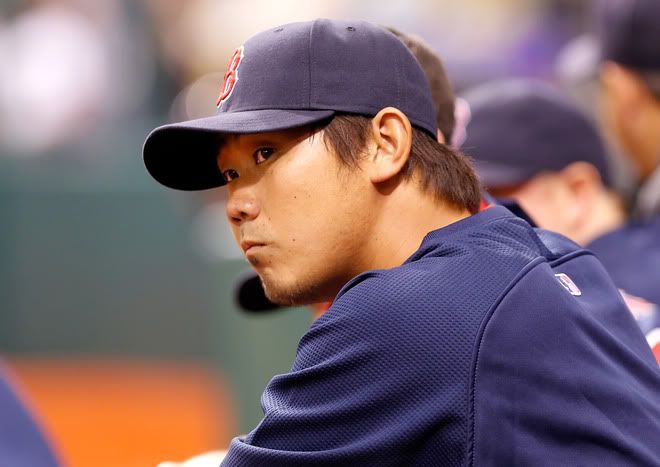 Pitcher Daisuke Matsuzaka(notes) #18 of the Boston Red Sox watches his team against the Tampa Bay Rays during the game at Tropicana Field on September 9, 2011 in St. Petersburg, Florida. 
