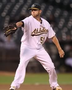 Dallas Braden #51 of the Oakland Athletics pitches against the Texas Rangers during a Major League Baseball game at the Oakland-Alameda County Coliseum on September 23, 2010 in Oakland, California.