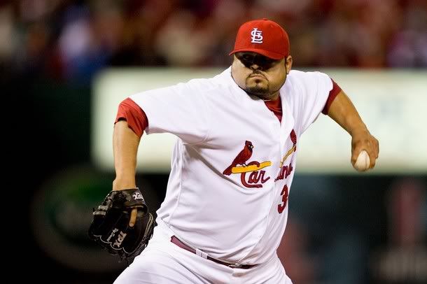 Relief pitcher Dennys Reyes #36 of the St. Louis Cardinals throws against the Atlanta Braves at Busch Stadium on April 26, 2010 in St. Louis, Missouri.