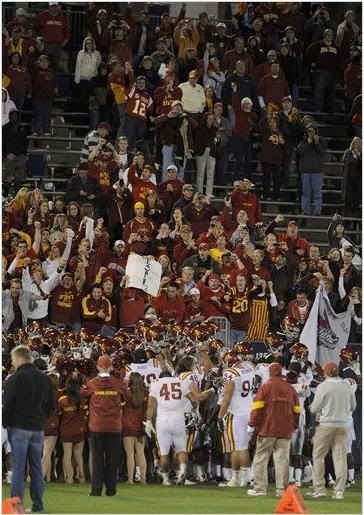 Iowa State fans celebrate with their team after their 24-20 victory over Connecticut in their NCAA college football game in East Hartford, Conn., on Friday, Sept. 16, 2011.