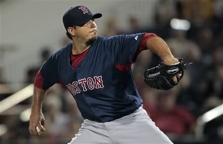 Boston Red Sox pitcher Josh Beckett(notes) works in the first inning of their Grapefruit League spring training season opening baseball game against the Minnesota Twins at Hammond Stadium in Fort Myers, Fla., Sunday, Feb. 27, 2011.