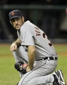 Detroit Tigers starting pitcher Justin Verlander kneels after Cleveland Indians' Michael Brantley scored from third on a squeeze bunt by Trevor Crowe in the fifth inning of the second game of a baseball doubleheader Wednesday, Sept. 29, 2010, in Cleveland.
