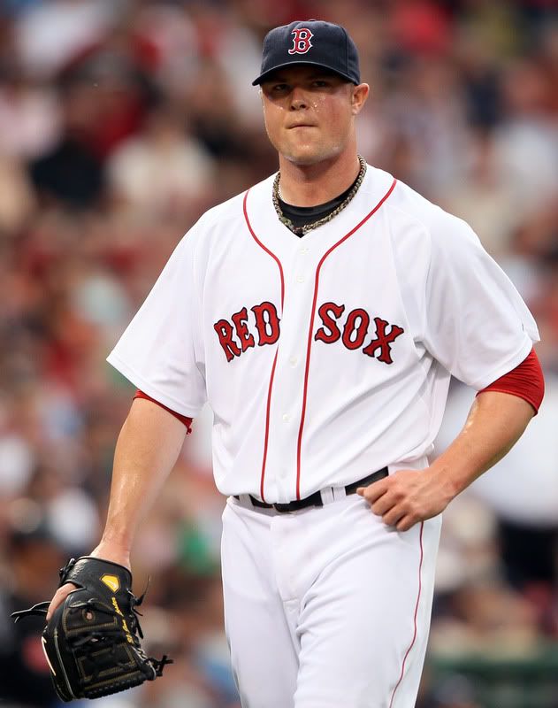 Jon Lester(notes) #31 of the Boston Red Sox walks back to the dugout after striking out Travis Snider(notes) of the Toronto Blue Jays to end the second inning on July 5, 2011 at Fenway Park in Boston, Massachusetts. (