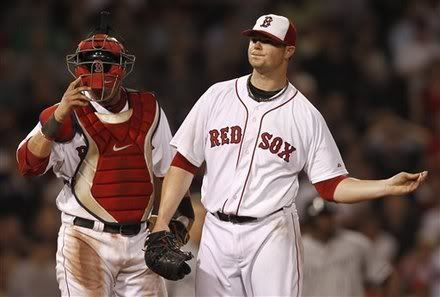 As Boston Red Sox catcher Jarrod Saltalamacchia(notes) looks down, starting pitcher Jon Lester(notes) throws his gum after giving up a two-run single to Chicago White Sox's Alexei Ramirez(notes) during the sixth inning of a baseball game at Fenway Park in Boston Monday, May 30, 2011.