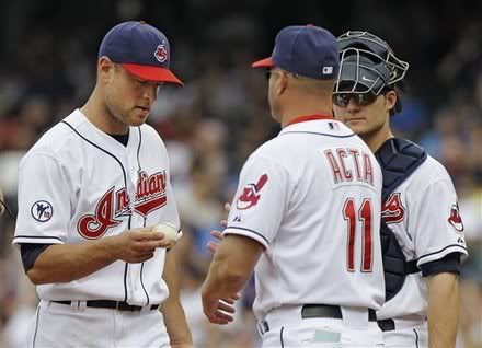 Cleveland Indians relief pitcher Frank Herrmann(notes) hands the ball to manager Manny Acta (11) as he leaves in the sixth inning of a baseball game against the Boston Red Sox, Wednesday, May 25, 2011, in Cleveland. Hermann gave up five runs in the inning before being relieved by Chad Durbin