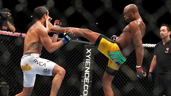 Anderson Silva's lightning-quick front kick to the jaw of Vitor Belfort ended their much-anticipated middleweight title bout in a stunning first-round knockout. 