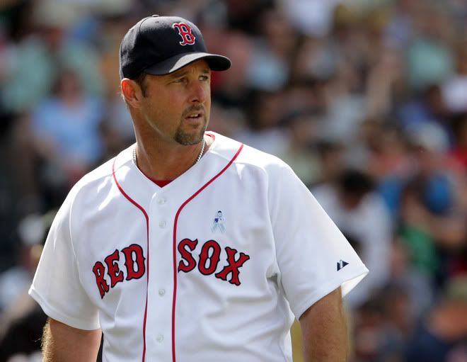 Tim Wakefield(notes) #49 of the Boston Red Sox glances at the scoreboard against of the Milwaukee Brewers at Fenway Park on June 19, 2011 in Boston, Massachusetts. 