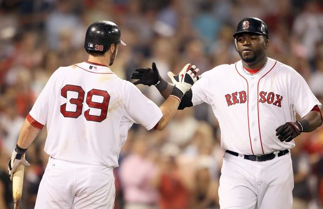 David Ortiz(notes) #34 of the Boston Red Sox is congratulated by Jarrod Saltalamacchia(notes) #39 after Ortiz hit a solo home run in the seventh inning against the Baltimore Orioles on July 7, 2011 at Fenway Park in Boston, Massachusetts. 