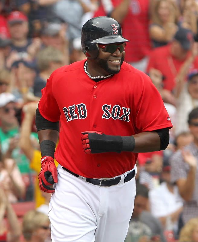 David Ortiz(notes) #34 of the Boston Red Sox smiles after scoring on a sacrifice fly against the Oakland Athletics in the third inning at Fenway Park August 27, 2011 in Boston, Massachusetts. 
