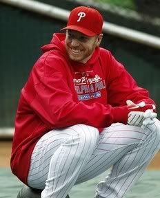 Roy Halladay #34 of the Philadelphia Phillies smiles during a workout before the NLCS against the San Francisco Giants at Citizens Bank Park on October 15, 2010 in Philadelphia, Pennsylvania.