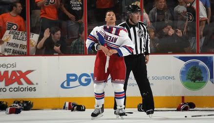 Sean Avery #16 of the New York Rangers checks the scoreboard following an altercation with the Philadelphia Flyers during an NHL preseason game at Wells Fargo Center on September 26, 2011 in Philadelphia, Pennsylvania.