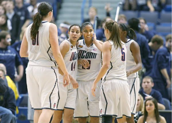 Kaleena Mosqueda-Lewis by Caroline Doty after Mosqueda-Lewis hit the floor in the 2nd half. The University of Connecticut Huskies play Stanford at the XL Center in Hartford Monday night. 