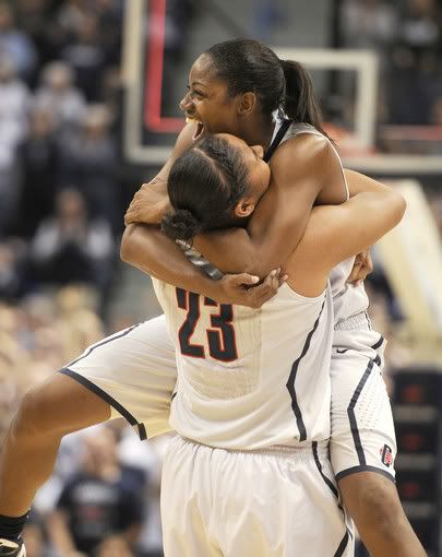 Tiffany Hayes gets a lift from Kaleena Mosqueda-Lewis after UConn beat Stanford 68-58. 