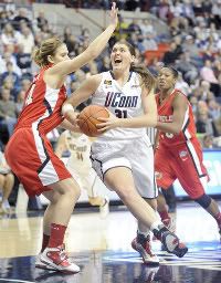 UConn's Stefanie Dolson drives to the basket against Fairfield Thursday night at Gampel Pavillion. Dolson scored 22 points. 
