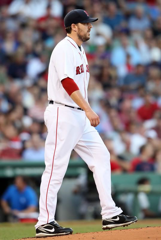 John Lackey(notes) #41 of the Boston Red Sox reacts after giving up a three run homer in the first inning against the Kansas City Royals on July 27, 2011 at Fenway Park in Boston, Massachusetts. 