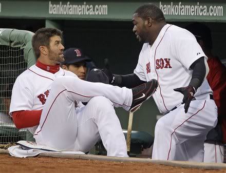 Boston Red Sox catcher Jason Varitek(notes), left, talks to designated hitter David Ortiz(notes) before the Red Sox's baseball game against the Tampa Bay Rays on Monday, April 11, 2011, in Boston. Varitek did not start the game.