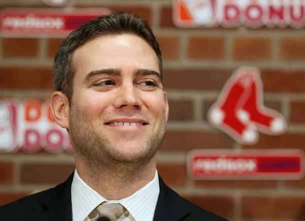 Theo Epstein, general manager of the Boston Red Sox, answers questions about Carl Crawford during a press conference on December 11, 2010 at the Fenway Park in Boston, Massachusetts.