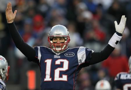 Tom Brady #12 of the New England Patriots reacts against the Miami Dolphins in the second half at Gillette Stadium on December 24, 2011 in Foxboro, Massachusetts.