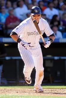 Colorado Rockies' Troy Tulowitzki reacts after popping-up in the seventh inning of a baseball game against the San Francisco Giants at Coors Field in Denver on Sunday, Sept. 26, 2010.