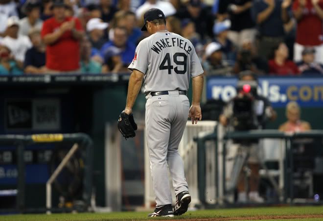 Starting pitcher Tim Wakefield(notes) #49 of the Boston Red Sox walks to the dugout after being taken out of the game in the sixth inning at Kauffman Stadium on August 20, 2011 in Kansas City, Missouri.