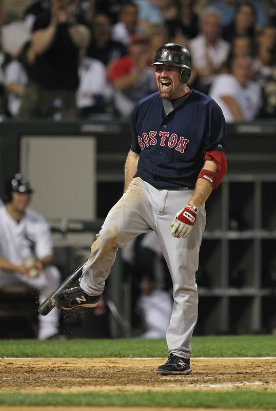 Kevin Youkilis(notes) #20 of the Boston Red Sox reacts after striking out against Gavin Floyd(notes) of the Chicago White Sox at U.S. Cellular Field on July 29, 2011 in Chicago, Illinois.