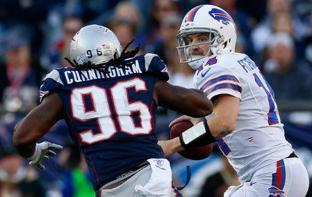 Jermaine Cunningham #96 of the New England Patriots chases Ryan Fitzpatrick #14 of the Buffalo Bills in the second half at Gillette Stadium on November 11, 2012 in Foxboro, Massachusetts. 