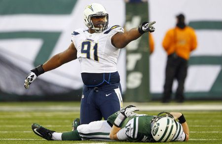 Kendall Reyes #91 of the San Diego Chargers reacts after sacking quarterback Greg McElroy #14 of the New York Jets during the second half at MetLife Stadium on December 23, 2012 in East Rutherford, New Jersey.
