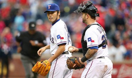  Koji Uehara #19 of the Texas Rangers at Rangers Ballpark in Arlington on September 16, 2012 in Arlington, Texas. 