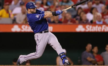 Mike Napoli #25 of the Texas Rangers hits an RBI double against the Los Angeles Angels of Anaheim in the third inning at Angel Stadium of Anaheim on September 19, 2012 in Anaheim, California. 