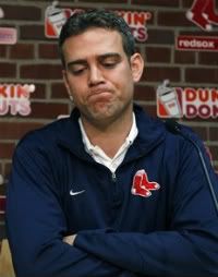 Boston Red Sox general manager Theo Epstein reacts at a news conference at Fenway Park in Boston, Thursday, Sept. 29, 2011, one day after the Red Sox failed to make the baseball playoff. Epstein said he won't make a scapegoat of manager Terry Francona after the team's unprecedented September collapse, and that everyone will be evaluated this offseason, including the manager and GM.