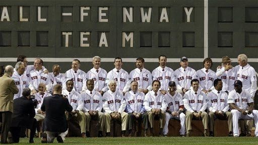 Members of the "All-Time Fenway Park Team" made up of former and current Boston Red Sox players pose for a photo prior to a baseball game against the Tampa Bay Rays at Fenway Park in Boston, Wednesday, Sept. 26, 2012.
