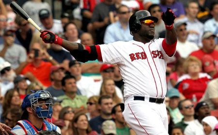 David Ortiz #34 of the Boston Red Sox and J.P. Arencibia #9 of the Toronto Blue Jays watches the flight of a home run by Ortiz in the fifth inning at Fenway Park June 27, 2012 in Boston, Massachusetts.