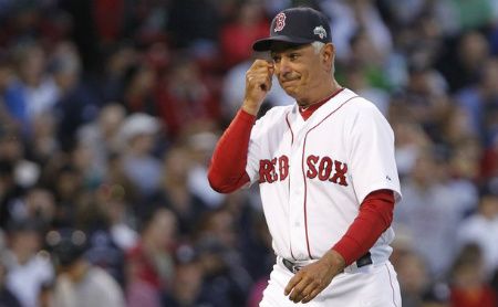 Boston Red Sox manager Bobby Valentine reacts as he walks back to the dugout after relieving pitcher Alfredo Aceves during the eighth inning of American League MLB baseball action against the New York Yankees at Fenway Park in Boston, Massachusetts April 21, 2012.