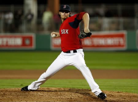 Clay Buchholz #11 of the Boston Red Sox pitches against the Pittsburgh Pirates during a Grapefruit League Spring Training Game at JetBlue Park on March 9, 2012 in Fort Myers, Florida.