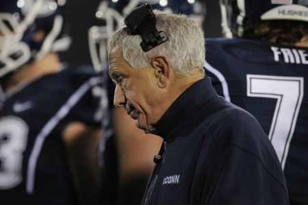 UConn coach Paul Pasqualoni reacts on the sideline late in Saturday's season finale against Cincinnati. 