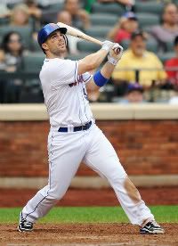 David Wright #5 of the New York Mets hits a RBI double to left field in the eight inning during a game against the Philadelphia Phillies at Citi Field on September 24, 2011 in the Flushing neighborhood of the Queens borough of New York City.