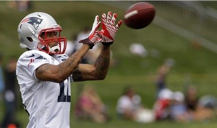 New England Patriots wide receiver Jabar Gaffney (10) pulls in a pass during practice on the second day of training camp at the NFL football team's facility in Foxborough, Mass. , Friday, July 27, 2012. 