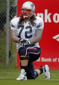 New England Patriots tackle Robert Gallery (72) takes a knee during an NFL football training camp in Foxborough, Mass. , Sunday, July 29, 2012.