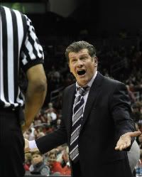 Connecticut head coach Geno Auriemma argues a call with official Wesley Dean during the second half of their NCAA college basketball game against Louisville Tuesday, Feb. 7, 2012 in Louisville, Ky.