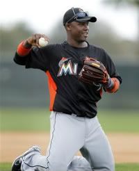 Miami Marlins third baseman Hanley Ramirez tosses a ball during a spring training baseball workout, Sunday, Feb. 26, 2012, in Jupiter, Fla.