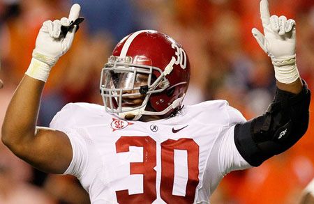 Dont'a Hightower #30 of the Alabama Crimson Tide calls the defense against the Auburn Tigers at Jordan-Hare Stadium on November 26, 2011 in Auburn, Alabama.