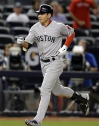 Boston Red Sox's Jacoby Ellsbury reacts as he rounds the bases after hitting a three-run home run during the 14th inning of the second game of a baseball double-header against the New York Yankees, Sunday, Sept. 25, 2011, at Yankee Stadium in New York.