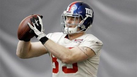 New York Giants' Jake Ballard catches a pass during practice, Friday, Feb. 3, 2012, in Indianapolis.