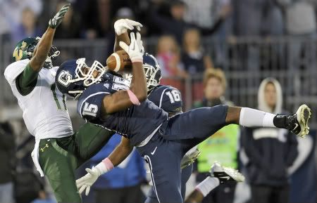 UConn safety Jerome Junior breaks up a pass intended for USF wide receiver Sterling Griffin as UConn defensive back Byron Jones helps on defense during the fourth quarter as the Huskies held on for a 16-10 victory.