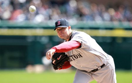 Jon Lester #31 of the Boston Red Sox pitches in the fifth inning on opening day against the Detroit Tigers at Comerica Park on April 5, 2012 in Detroit, Michigan. 