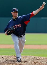 Pitcher Jon Lester #31 of the Boston Red Sox pitches against the Baltimore Orioles during a Grapefruit League Spring Training Game at Ed Smith Stadium on March 11, 2012 in Sarasota, Florida. 