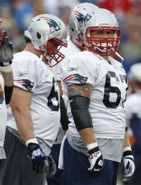 New England Patriots center Dan Koppen waits to set on the line of scrimmage during NFL football training camp in Foxborough, Mass. , Wednesday, Aug. 3, 2011