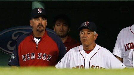  Randy Niemann #68 and Bobby Valentine #25 of the Boston Red Sox watch the action from the dugout during a game with the Los Angeles Angels at Fenway Park on August 21, 2012 in Boston, Massachusetts.